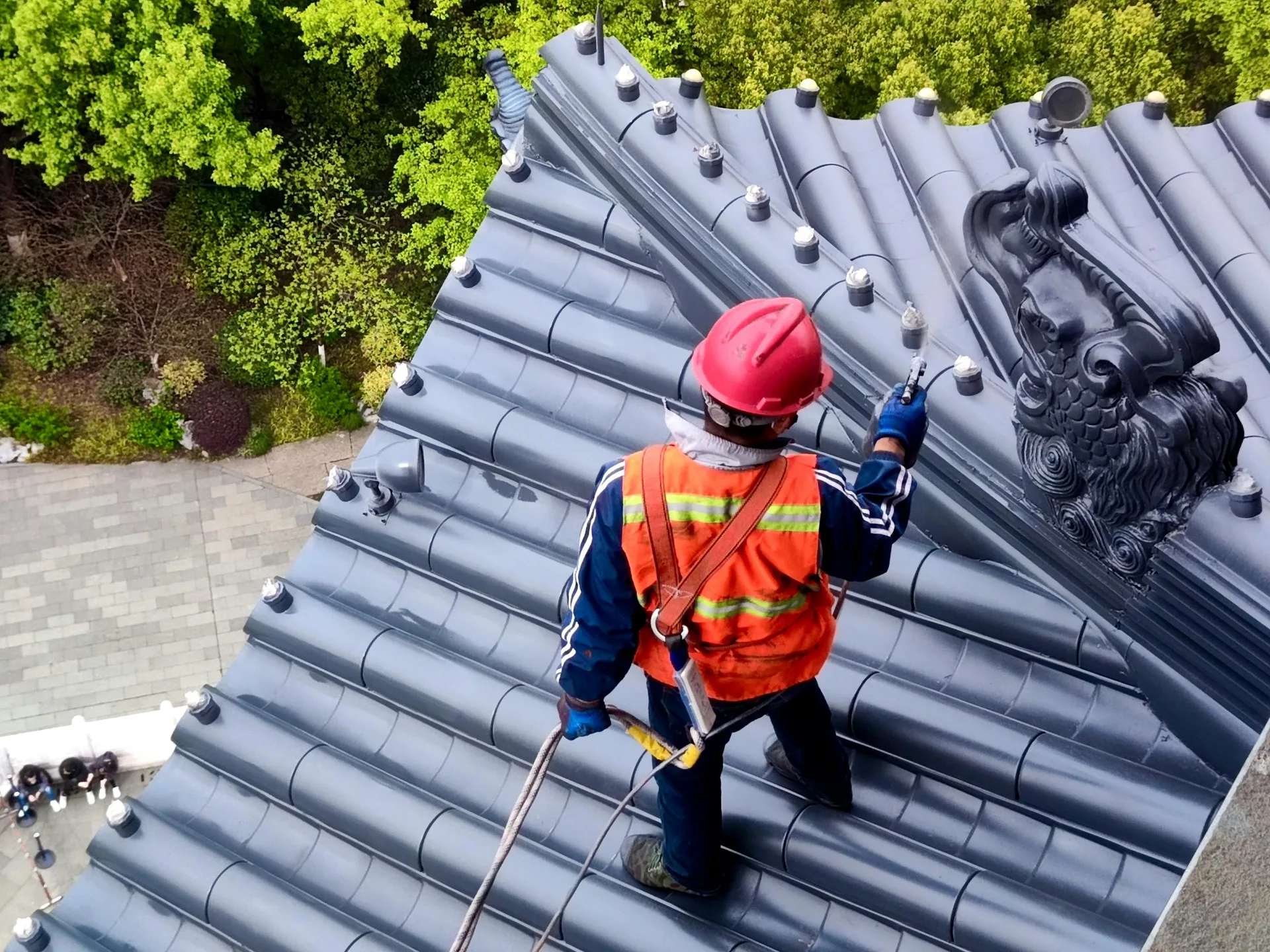 Roofing professional at work